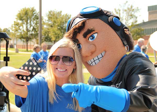 ASU Ace the Aviator Taking Picture With Fan