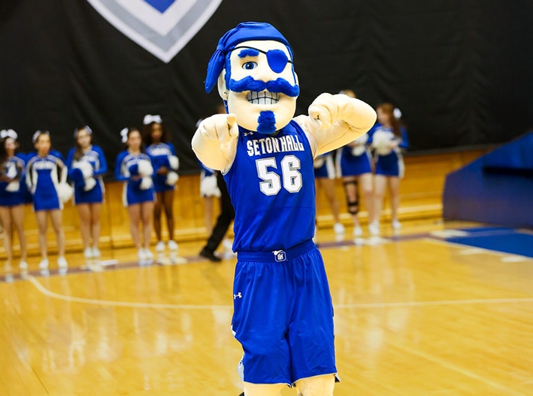 Seton Hall Pirate Mascot in a basketball uniform.