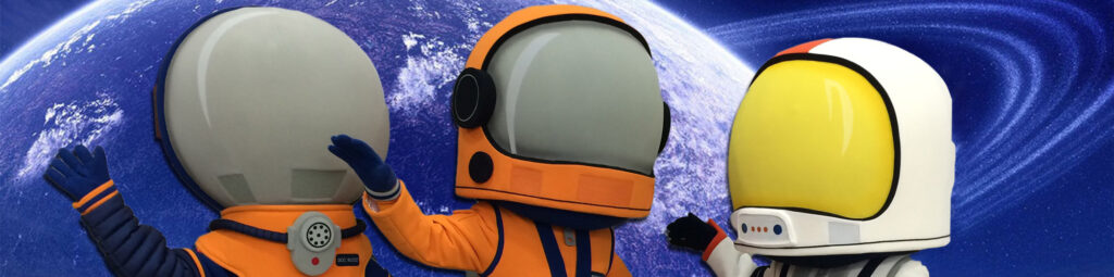 Three space themed mascot helmet heads
