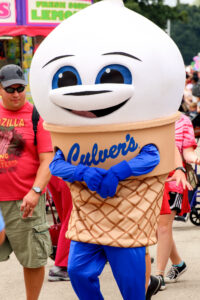 Culver's Scoopy walking in a state fair