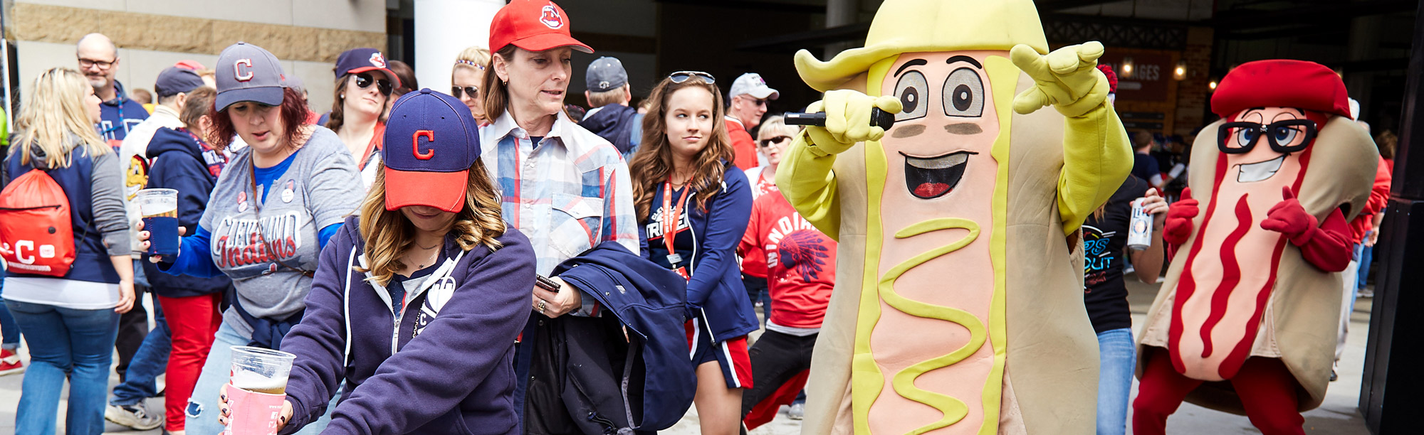 Cleveland Indian's hot dog mascots sing and dance