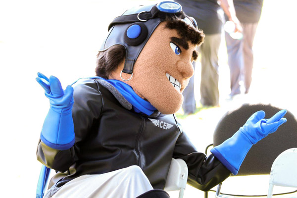 Pilot mascot shrugging in chair with head tilted