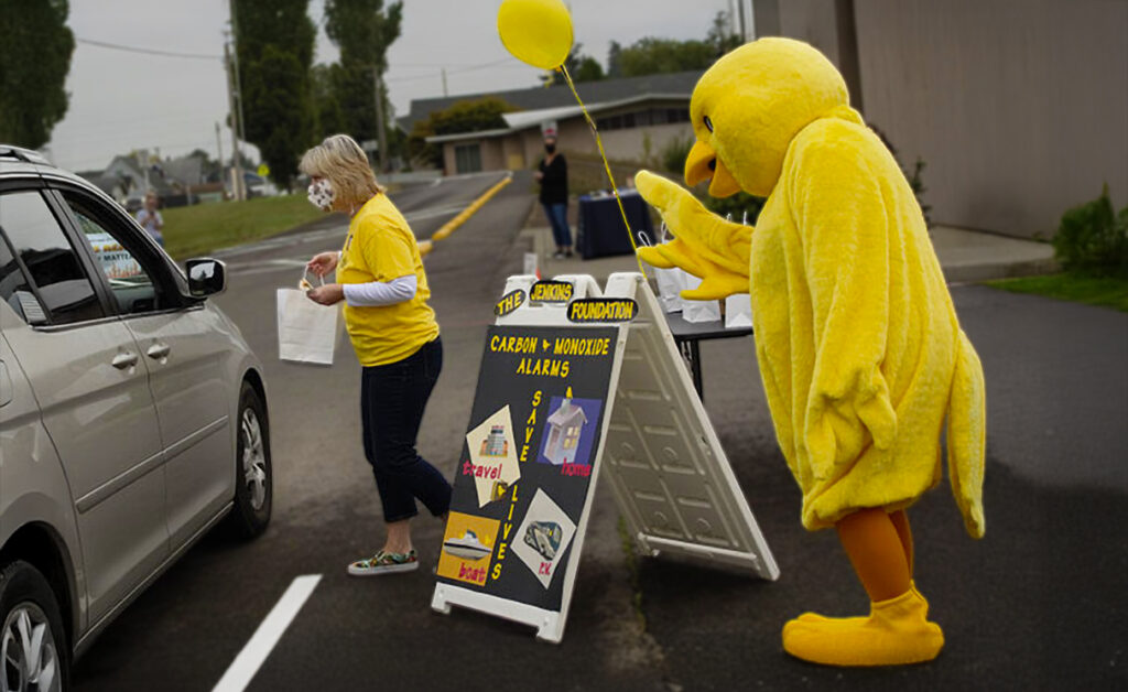 Yellow Canary Mascot at fundraiser.