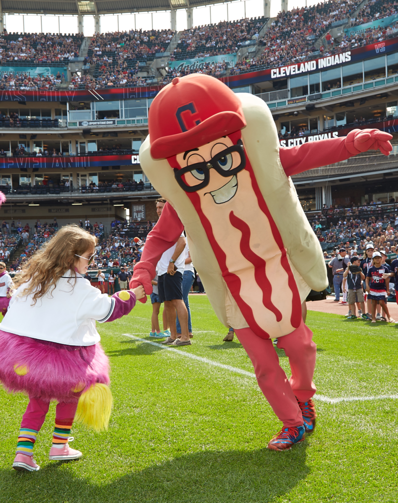 Sugardale Hot Dog Mascot shakes child's hand
