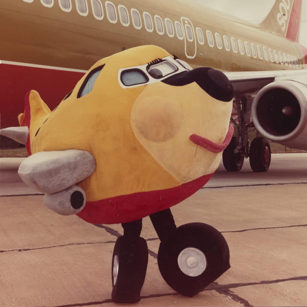 One of the Very first pictures of Southwest's T.J. Luv Mascot. Here he is in front of a Boeing 737