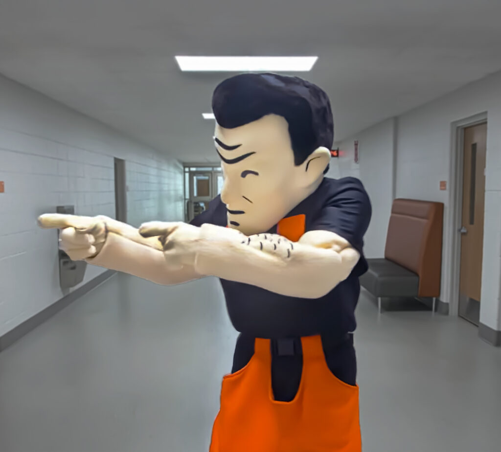 Marshman Mascot in hallway