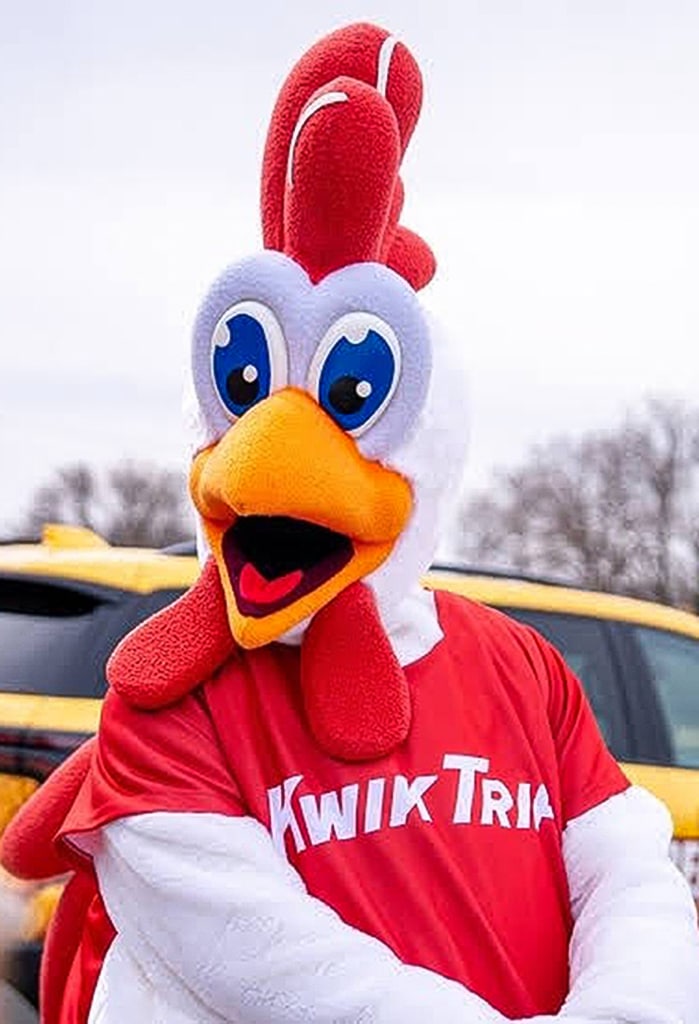 Kwik Trip's mascot, Red the Rooster, posing for a picture on the Red Zone Midwest Tour